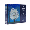 500 piece puzzle with image of Survivor Tree in bloom.