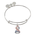 An expandable silver bracelet with a charm featuring a 9/11 Memorial and Museum emblem.