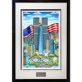 Framed art print featuring a colorful illustration of the New York City skyline with the Twin Towers, Statue of Liberty, White and American flags, shown in a black frame with white matting.