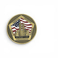 A commemorative round coin with a gold-toned border and a central design featuring the United States flag, the Twin Towers, and the text 'Flight 11', 'Flight 77', 'Flight 175', 'Flight 93', 'September 11, 2001', and 'Never Forget' on a white background.