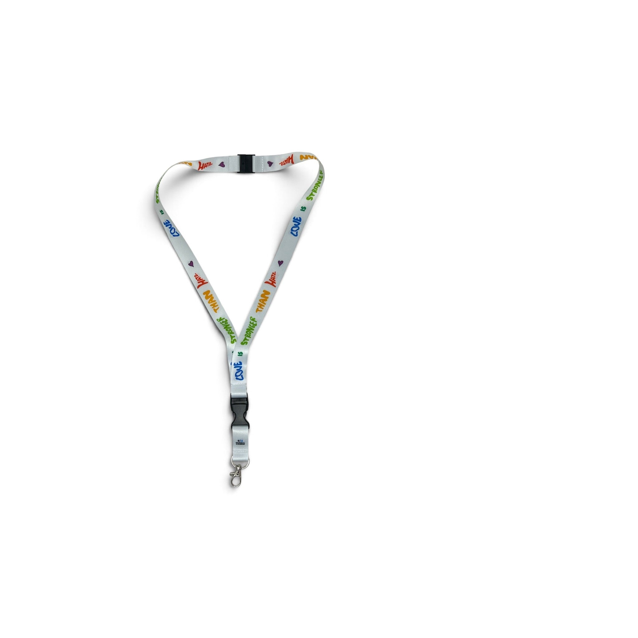 A white lanyard with a colorful Love is Stronger than Hate print and black plastic quick-release clips, shown on a plain white background.