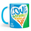 Mug with 'Love is Stronger than Hate' text on a white background