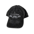 Charcoal grey cap with 'New York City Never Forget' text and skyline design.