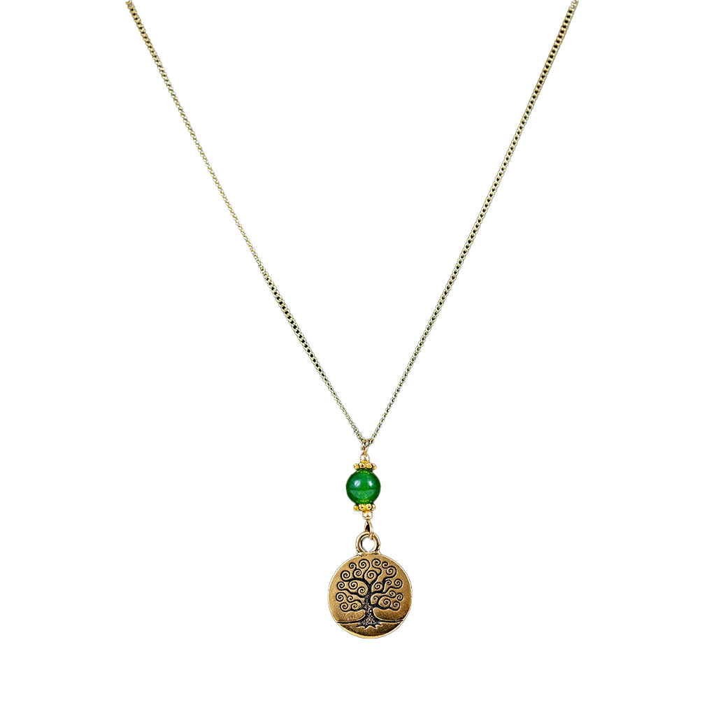 Gold-plated necklace with a round gold charm featuring a stylized tree and a small green jade stone.