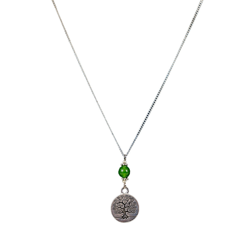 Silver-plated necklace with a round silver charm featuring a stylized tree and a small green jade stone.