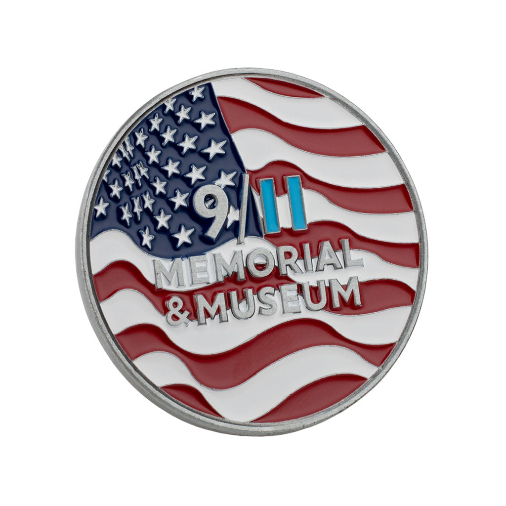 Memorial and Museum coin with American flag design on a white background