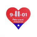 Heart-shaped car magnet with red top and royal blue tip that states "9-11-01" "NEW YORK - WASHINGTON DC - PENNSYLVANIA" "NEVER FORGOTTEN".