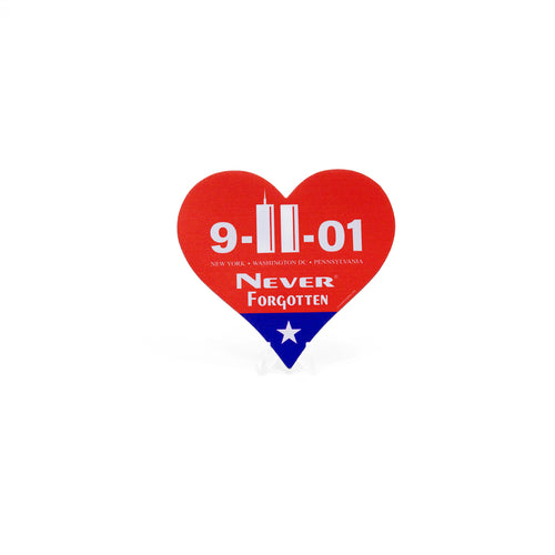 Heart-shaped sticker with red top and royal blue tip that states "9-11-01" "NEW YORK - WASHINGTON DC - PENNSYLVANIA" "NEVER FORGOTTEN".