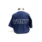 Back of navy youth t-shirt with FDNY logo in white block letters.