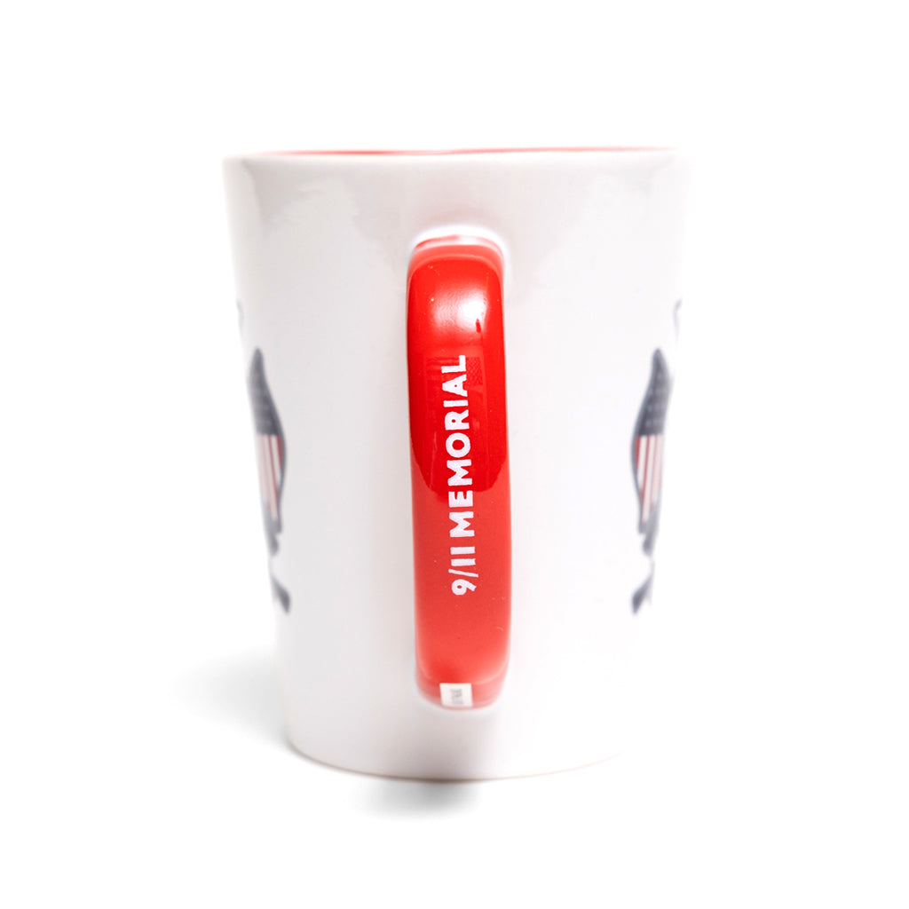 The red mug handle showing the 9/11 MEMORIAL logo