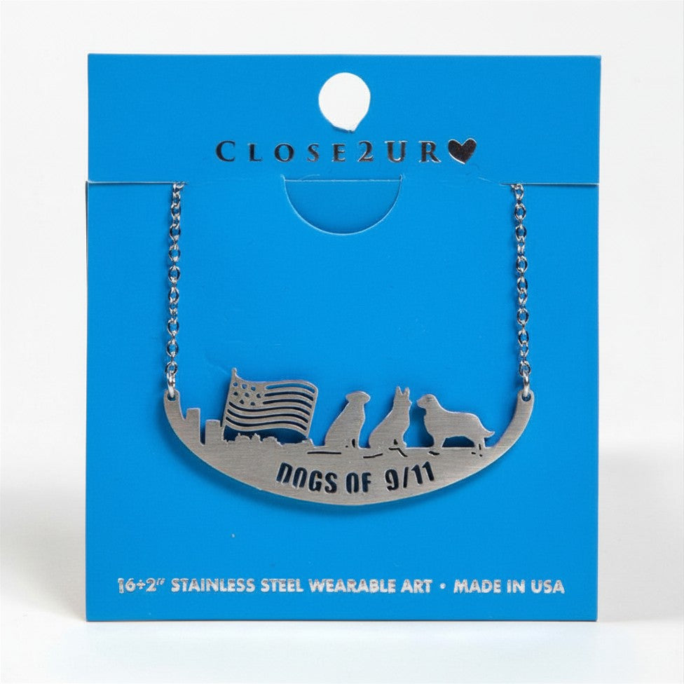 Necklace with 'Dogs of 9/11' design on a blue card with 'Close 2 Ur Heart' branding.