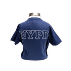 The back of a navy youth t-shirt with NYPD in white block letters.