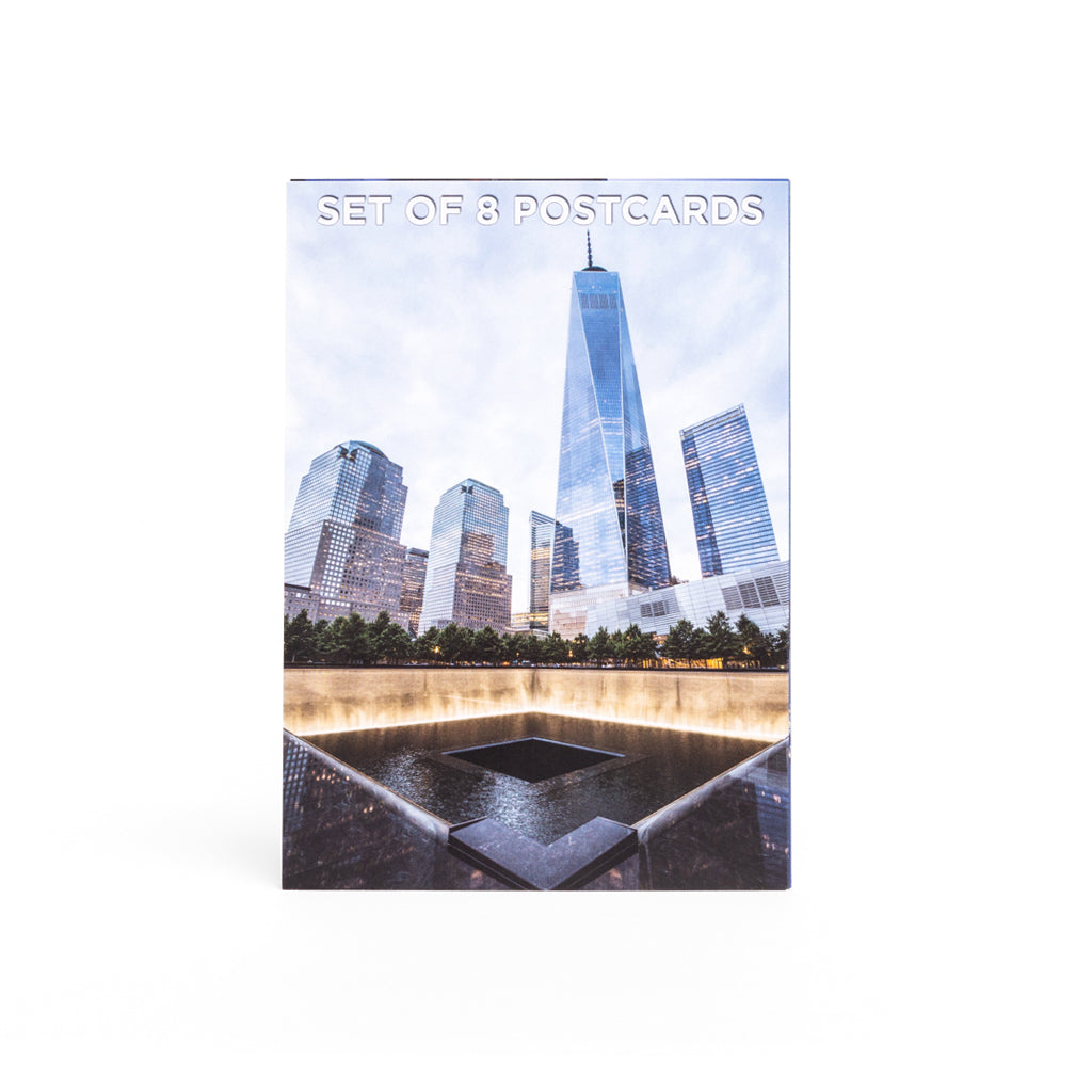 A postcard featuring the 9/11 Memorial & Museum with a view of the memorial site in New York City.