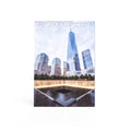 A postcard featuring the 9/11 Memorial & Museum with a view of the memorial site in New York City.
