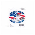 A sticker with an American flag design and 'REMEMBER 9/11' text, indicating a patriotic theme.