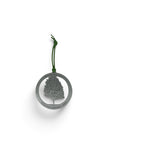 A silver metal keepsake featuring a tree silhouette inside a circular frame with the words RESILIENCE • RENEWAL • Hope engraved along the bottom edge, hanging from a dark green cord on a white background.