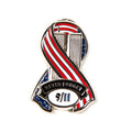 A metal die-cut ribbon magnet with a patriotic design featuring an American flag and the text 'Never Forget 9/11'.