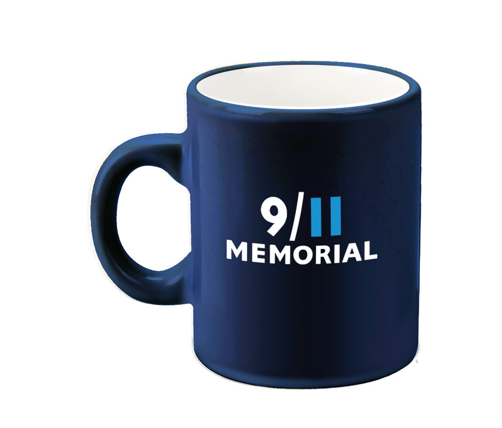 A navy mini mug with the 9/11 Memorial logo on the back.
