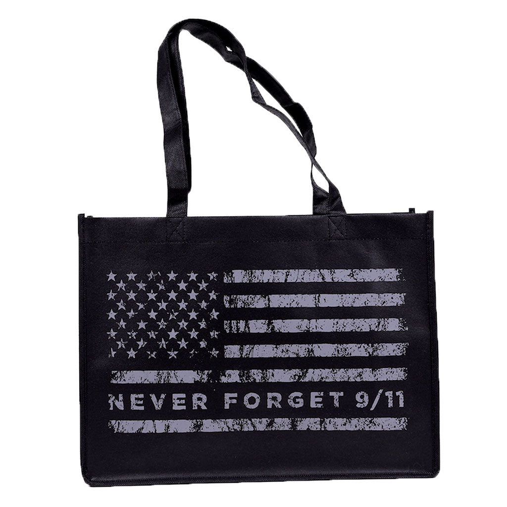 A black tote bag with a grey American flag design and the text 'NEVER FORGET 9/11' on it.
